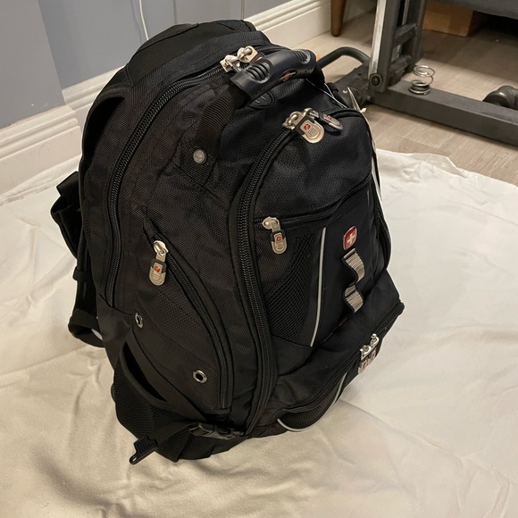 NEW WEGNER BACKPACK; in perfect condition with added silver design in the front! - Picture 6 of 14